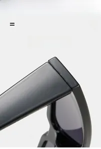Detail showing high elasticity and lightweight frame of black triangular sunglasses