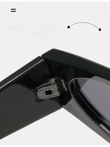 Macro detail of high-quality metal reinforced hinges on black cat-eye sunglasses frames