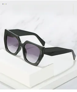 Detail of geometric sunglasses with wide black temples and purple gradient lenses