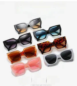 Close-up of stylish hexagonal geometric sunglasses in various colors and finishes