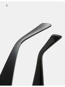 Close-up of curved glossy black sunglass mirror legs for comfortable ergonomic wear