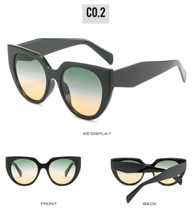 Three views of black cat eye sunglasses featuring green to orange gradient lenses and wide temples