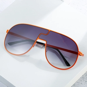 Lunettes de soleil oversize sans monture, cadre orange vif et verres violets dégradés chic