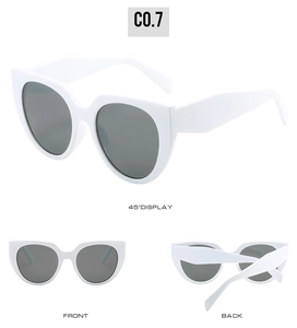 Three-angle view of white wide-frame cat-eye sunglasses with dark lenses and logo detail