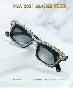 Detailed view of luxury square sunglasses with shimmering rhinestones and grey gradient lens