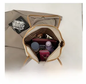 Top view of spacious tote interior with compartments for laptop and daily essentials