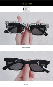 Detailed view of oversized square sunglasses featuring premium rhinestone crystals on the frame