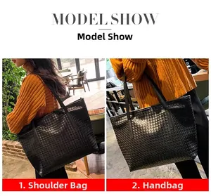 Detailansicht der schwarzen gewebten Ledertasche mit Schulter- und Handtragevarianten