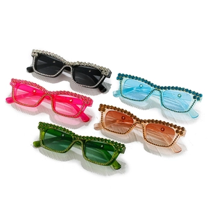 Chic square Y2K sunglasses with sparkling rhinestones in multiple vibrant color frames