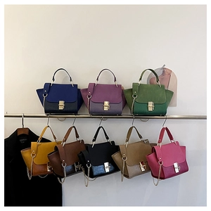 Chic croc-embossed chain shoulder bag available in diverse colors with metal lock