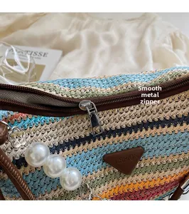 Detailed macro of smooth metal zipper and colorful woven texture with fashion logo