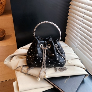 Quilted black bucket bag with rhinestones, metal ring handle and pearl drawstring