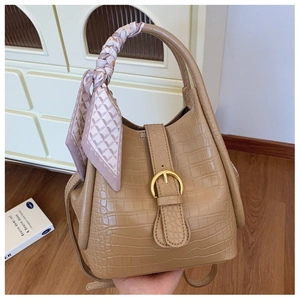 Brown crocodile embossed bucket bag with gold buckle and decorative silk scarf handle