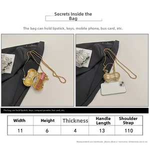 Detailed size chart for peanut-shaped metal dinner bag with pearl and rhinestone accents