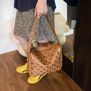 Brown litchi faux leather shoulder bag with silver metal studs in street style