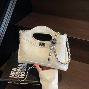 White quilted faux leather chain shoulder bag with metal twist lock and top handle