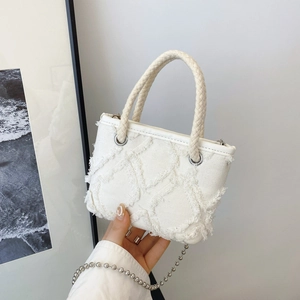 Petit sac rond en tweed blanc texturé avec poignée tressée et chaîne argentée