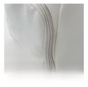 Close-up of white lychee texture bag with smooth metal zipper and precision stitching