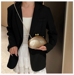Champagne gold pebble acrylic clutch bag with glossy marble texture and chain