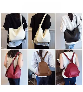 Detail showing various colors of large leather backpacks in white, black, burgundy and brown