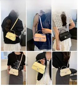 Detailed view of quilted faux leather crossbody bags with gold chain handles in four colors
