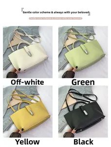 Detail view of four-color lychee texture crossbody bags with silver twist locks