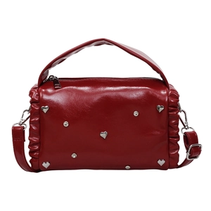 Chic red shoulder bag with silver heart studs and sparkling rhinestones detailing
