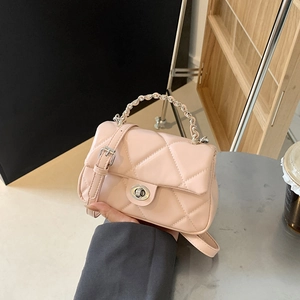 Pink quilted leather crossbody bag with chain handle and silver twist lock closure