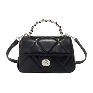 Classic black quilted crossbody bag with silver rotating metal lock and chain strap