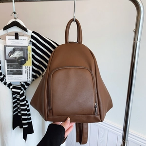 Brown litchi grain faux leather backpack with triangular structure and top handle