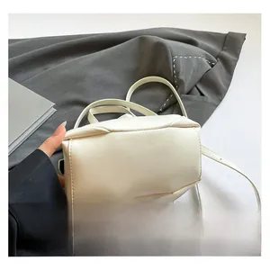 Close-up of the beige PU leather base with clean stitching and premium grain texture