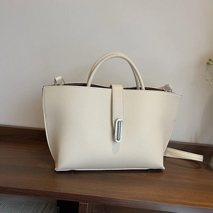 Chic cream white crossbody tote bag in lychee pattern with silver oval metal buckle
