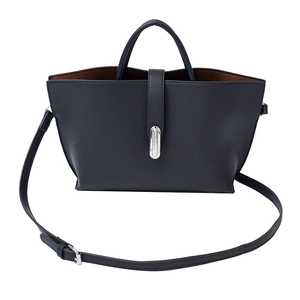 Minimalist black lychee pattern leather tote bag with silver metal lock and shoulder strap