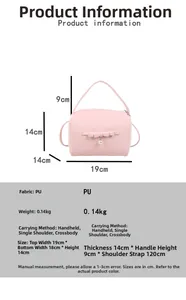 Details zur rosa PU-Handtasche mit Maßen, Perlen-Schleifen-Anhänger und Größenangaben