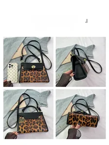 Dettagli della borsa leopardata con chiusura a scatto dorata e tracolla nera elegante