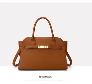 Close-up of litchi texture brown tote bag featuring golden metal buckle and stitching
