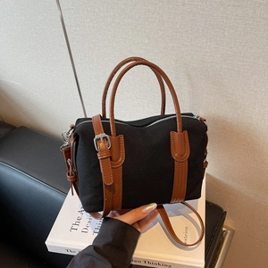 Sac Boston vintage en toile avec anses en cuir marron et bandoulière réglable