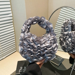 Silver pleated flower handbag with satin ruffled texture for elegant women