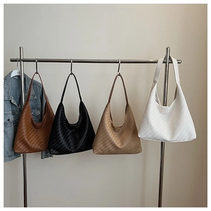 Detailed comparison of four hobo bags with woven texture in brown, black, khaki, and cream