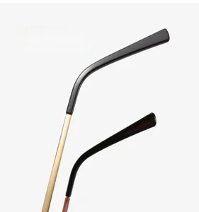 Detail of curved metal temple with ergonomic black tip for anti-blue light glasses
