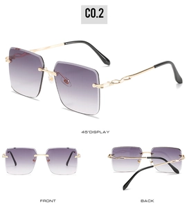 Détails de lunettes de soleil sans monture dégradées avec branches dorées ondulées