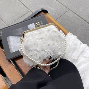 Elegant white 3D floral evening bag with pearl handle and gold chain strap