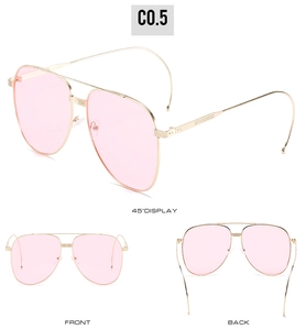 Détails des lunettes aviateur avec verres roses et monture en métal doré minimaliste