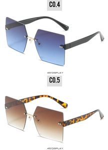 Detail view of rimless square sunglasses with gradient lenses and decorative metal rivets