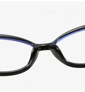Close-up of comfortable integrated nose pads on black cat-eye glasses frame