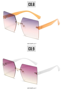 Detail view of oversized rimless square sunglasses with gradient lenses in purple and orange