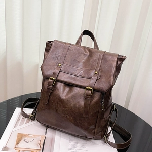 Retro brown faux leather college backpack with buckle closure and side zipper pocket