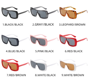 Grid view showcasing oversized one-piece sunglasses in nine fashion candy color variants