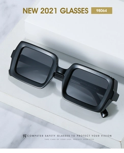 Detail view of KD98064 model number and size specifications on black matte sunglass temple