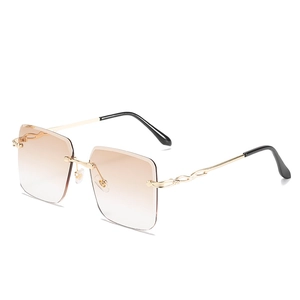 Lunettes de soleil sans monture carrées dégradées avec branches en métal doré tressé